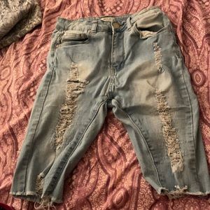 Knee high Ripped Jean shorts in size small